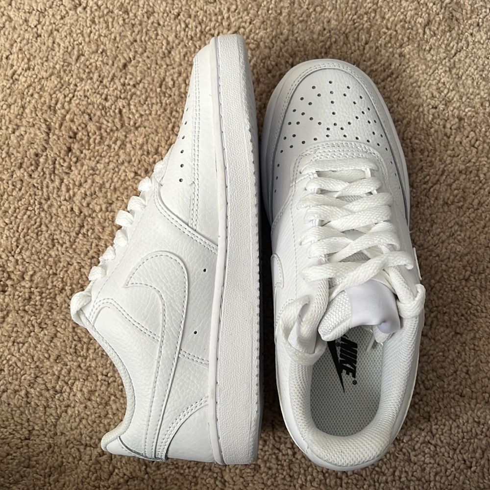 NWOT and box Nike low tops. Never worn.